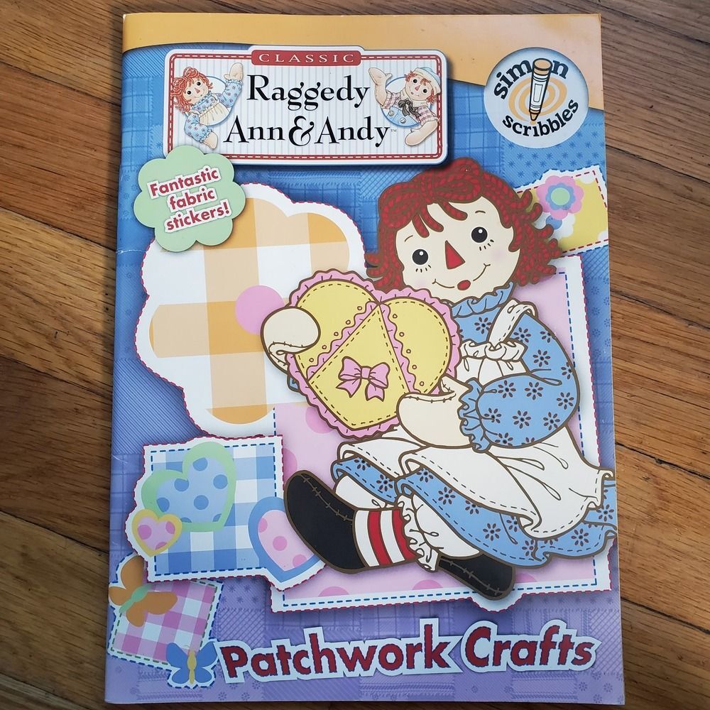 Raggedy Ann & Andy‎ patchwork crafts coloring book with fabric stickers 2006